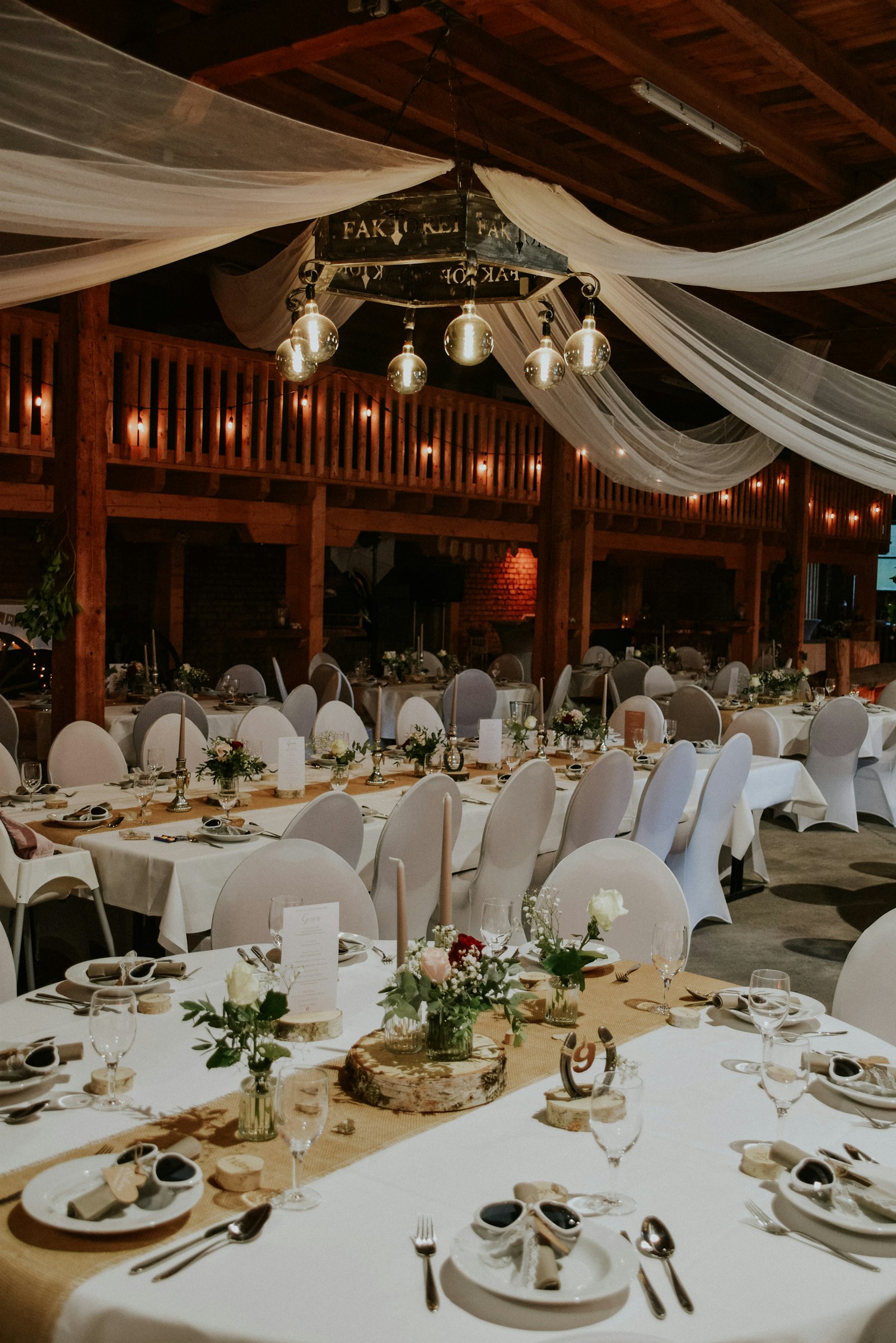 Reception tables with drapery and lighting